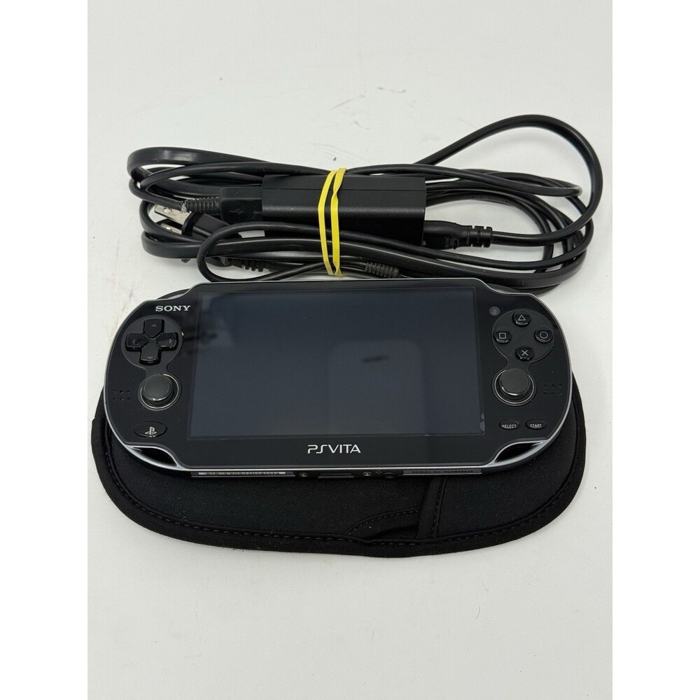PS Vita OLED (PCH-1001) With Charger & 7 Game Lot TESTED